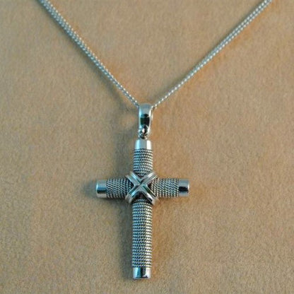 Handmade 18K White gold cross with knitted wires.