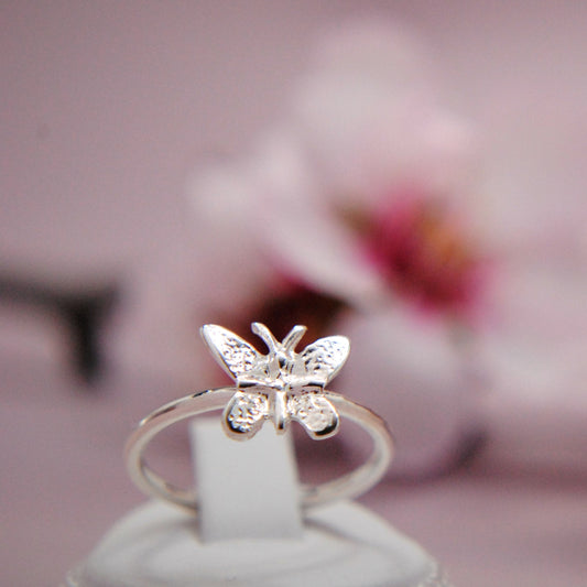 Tiny butterfly sterling silver ring