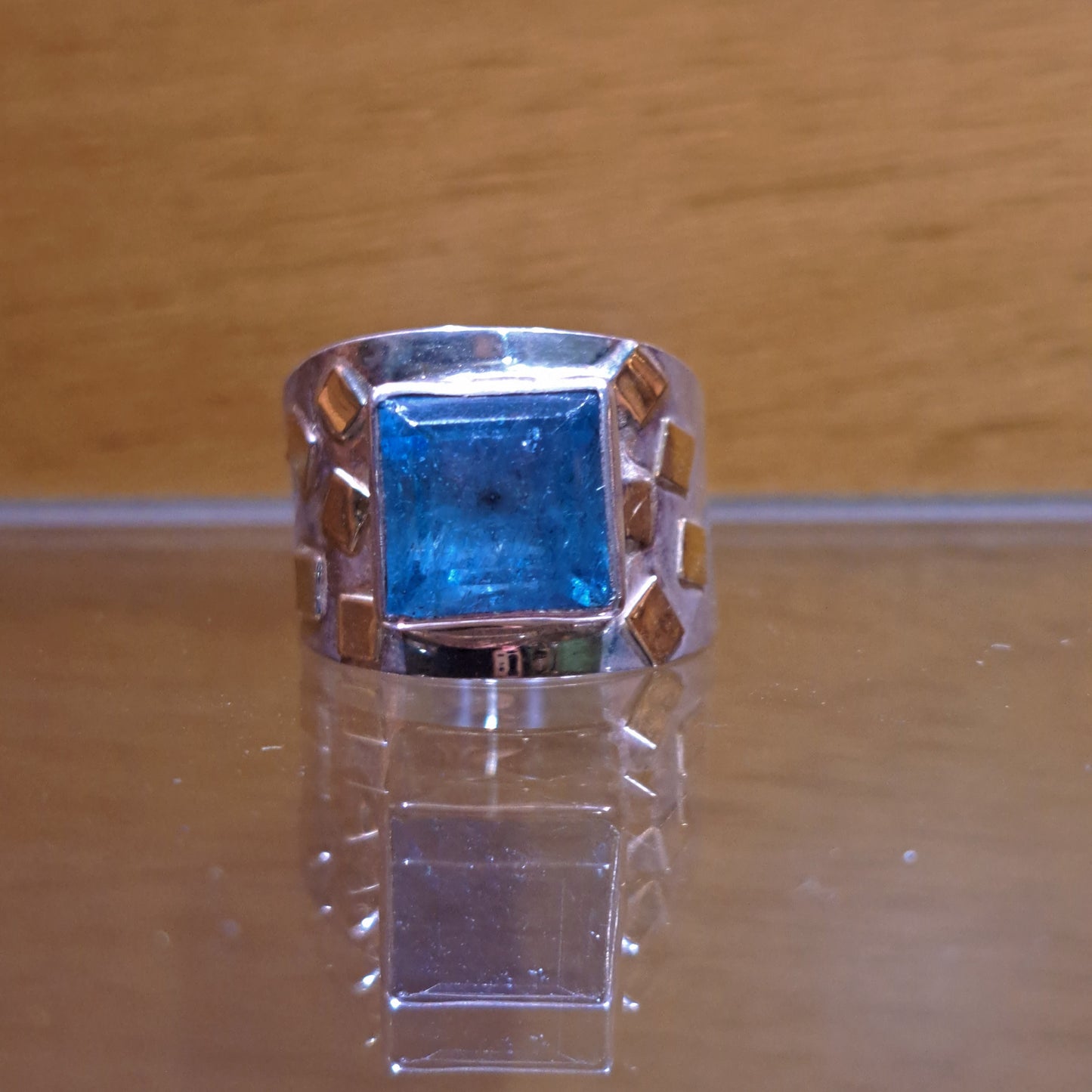 Handmade silver ring with aquamarine and 14K gold.