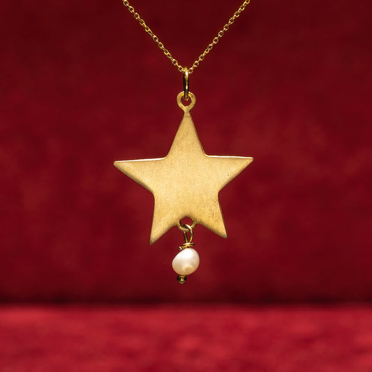 Gold plated sterling silver star with pearl