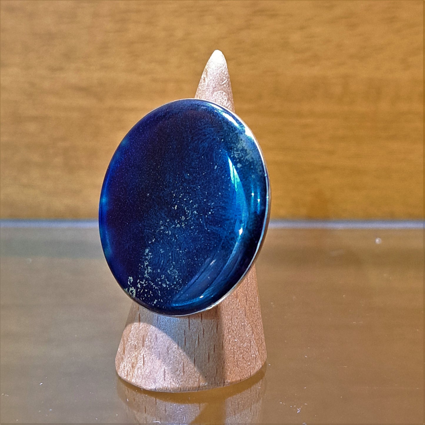 Handmade sterlingsilver and brass ring with blue enamel