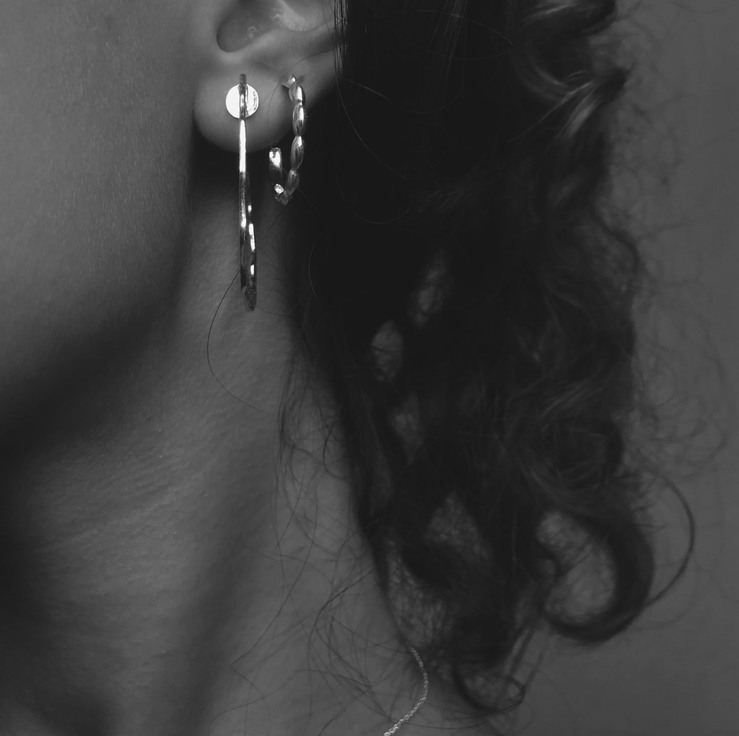 Hoops gold plated silver earrings.